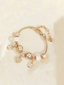 1 件简约优雅串珠手链，带粉色幸运四叶草、花朵、捕梦网、心形和音符饰物，适合青少年、青年、姐妹的时尚友谊/派对礼物