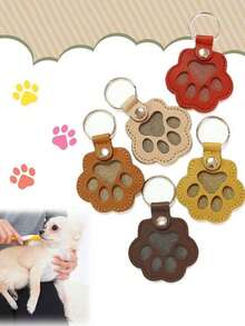 Llavero con colgante de pata de gato de cuero creativo y de dibujos animados como accesorio para prevenir la pérdida de mascotas