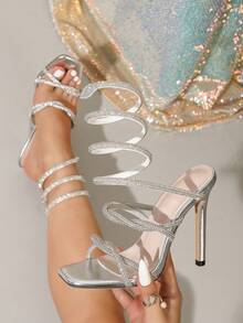 1 paire de sandales à talons hauts super sexy , sandales pour femmes avec des brides croisées ornées de strass et une enveloppe en forme de serpent, talons hauts argentés pour la piste et les soirées
