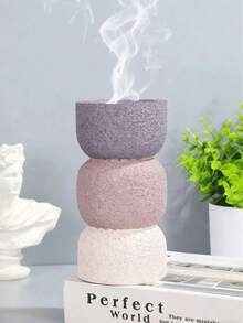 Un arzător de aromaterapie din rășină, proaspăt și elegant, în alb și negru. Poate fi folosit pentru decorarea și aromaterapia casei, la birou, în locuri de festival și yoga. Poate fi folosit și ca decorațiune în sufragerie, cadou pentru întoarcerea la școală, cadou de absolvire, suvenir, cadou de Ziua Îndrăgostiților și cadou pentru femei. Cadou de nuntă.