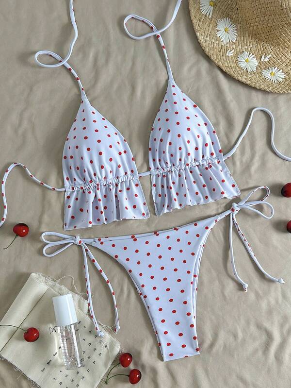 Elegant Women's Spaghetti Strap Bikini Set With A White Base And Red Polka Dots, Featuring Tie-Side Bottoms And A Ruffled Top. Casual Yet Sexy, Perfect For Beach Vacations, Pool Parties, And Summer Getaways