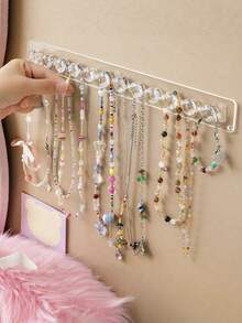 1 pièce Support organisateur de bijoux pour colliers, bracelets, boucles d'oreilles et bagues. Présentoir mural transparent pour table de maquillage, armoire à glace. Crochet multifonctionnel de rangement de bijoux pouvant être utilisé dans les dortoirs scolaires, organisateur de stockage d'été, cadeau de rentrée scolaire