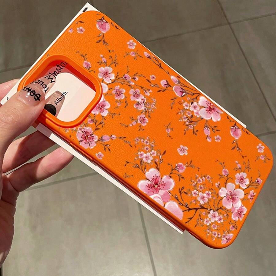 Funda de teléfono con flor de ciruelo rosa suave, adecuada para iPhone 16/15/14/13/12/X y otros modelos, disponible en siete colores, ligera, duradera y de moda, que proporciona una protección de alta calidad - Naranja - Ver 1