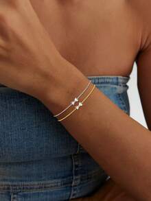 1 brățară din argint sterlin S925 cu fundă, pentru femei, încrustată cu diamante și cu un design de nișă. Are un stil modern și minimalist, potrivită pentru cele mai bune prietene și pentru asortarea zilnică a femeilor și, de asemenea, un cadou excelent pentru mame, surori și iubite.