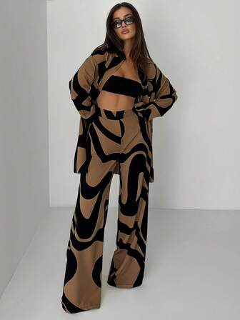 Conjunto de camisa de manga larga y pantalones de estampado de color contrastante de moda casual para mujer