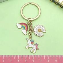 1 pieza Llavero de aleación con unicornio de arcoíris de dibujos animados con efecto de goteo de aceite, lindo colgante de arcoíris para bolsos de niñas