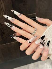 10片手工椭圆形长尖头美甲贴片，优雅黑粉色美甲，闪亮猫眼美甲，黑色法式美甲，手绘不规则线条，3D蝴蝶结钻石镶嵌美甲宝石，前卫温柔奢华的秋季美甲，秋季贴片美甲，适合派对、日常、约会、海滩、热带度假等场合，DIY假指甲艺术，适合女性和女孩作为礼物，美甲用品 - 彩色 - 查看 4