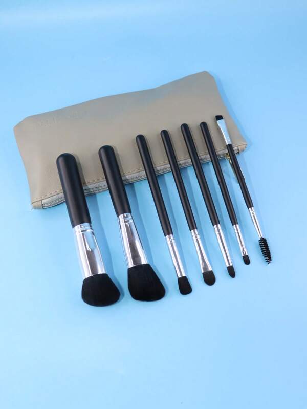 Set de 7 pensule de machiaj cu husă, inclusiv pensulă pentru fond de ten, pensulă pentru blush, pensulă pentru rimel, pensulă pentru fard de pleoape, pensulă pentru buze, pensulă pentru sprâncene unghiulară, set portabil de pensule de machiaj pentru călătorie