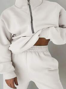 Women's Two-Piece Set Sweatshirt Fleece Sports Street Casual Fashion Outfit For Women. Made With Soft Fleece Fabric And A Half-Zip High Neck Design, This Set Of Two Sweatshirts And Jogger Pants Offers A Perfect Balance Of Warmth And Comfort With A Sweet And Relaxed Vibe. It's A Chic And Effortless Essential For Autumn And Winter, Ideal For Lounging At Home Or Going Out Casually. - 白色 - 查看 2