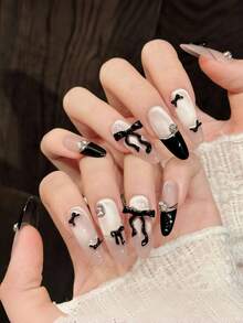 10片手工椭圆形长尖头美甲贴片，优雅黑粉色美甲，闪亮猫眼美甲，黑色法式美甲，手绘不规则线条，3D蝴蝶结钻石镶嵌美甲宝石，前卫温柔奢华的秋季美甲，秋季贴片美甲，适合派对、日常、约会、海滩、热带度假等场合，DIY假指甲艺术，适合女性和女孩作为礼物，美甲用品 - 彩色 - 查看 6