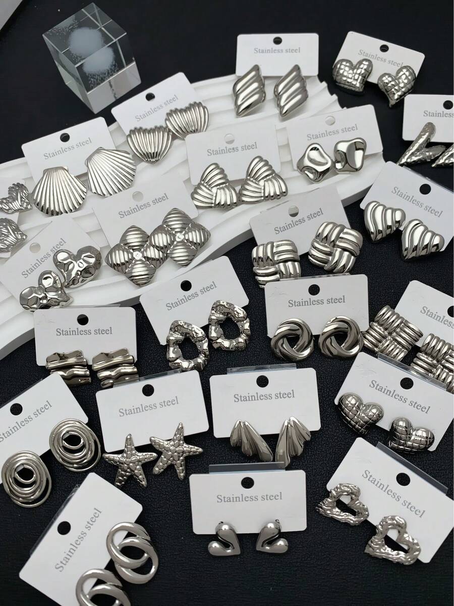 18 Pieces / 9 Pairs. Stainless Steel Heart-Shaped/Leaf-Shaped/Wing-Shaped Earrings. Various Styles Can Be Freely Combined. Suitable For Women's Daily Wear.