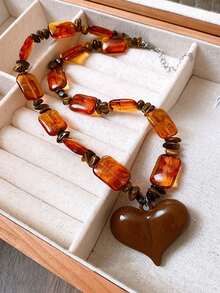 Collar con colgante de corazón de piedra de ojo de tigre de resina, estilo europeo y americano, collar gargantilla versátil y vintage, accesorio de collar único y de alta gama