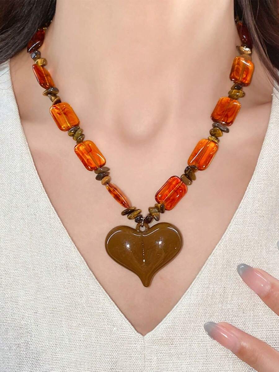 Collar con colgante de corazón de piedra de ojo de tigre de resina, estilo europeo y americano, collar gargantilla versátil y vintage, accesorio de collar único y de alta gama