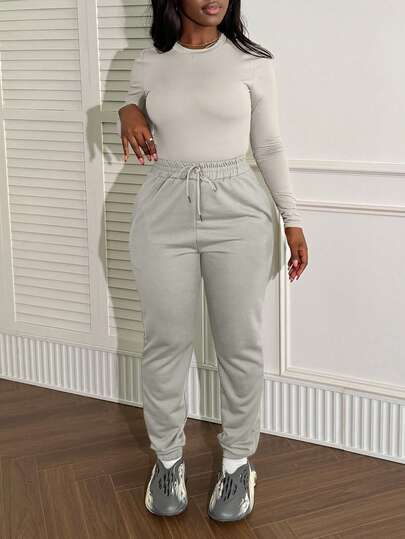 LovelyWholesale Conjunto de 2 piezas de camiseta de manga larga de cuello redondo y pantalón de chándal con bolsillo con cordón, unicolor, para mujer, para primavera y otoño