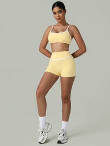 Bộ đồ thể thao 2 món mùa xuân hè dành cho nữ, gồm áo ngực và quần short tập yoga, chạy bộ. - Màu vàng - Xem 3