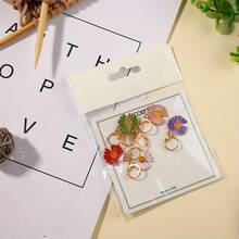 6 piezas Marcadores de puntada trenzados de margarita de aleación - Marcadores de puntada con cierre de esmalte floral vibrante, accesorios de proyecto trenzados duraderos (6 colores), marcadores de garabatos coloridos - Multicolor - Ver 11