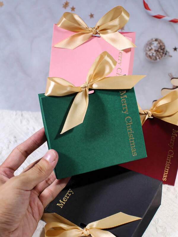 5 piezas Bolsa de regalo de Navidad, impresa con "Feliz Navidad" y adornada con un lazo de cinta dorada, es un regalo navideño festivo que realza el ambiente navideño. Se puede usar como caja de dulces para regalos de Navidad