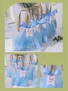 مجموعة أكياس هدايا زرقاء مع شريط، علاقة بطاقة وحشو من الحشيشة الاصطناعية. قابلة لإعادة الاستخدام، بتصميم مقبض. مناسبة لتغليف هدايا الحفلات، تذكارات الزفاف، تغليف منتجات البيع بالتجزئة، هدايا عيد الميلاد، تغليف الهدايا التذكارية، الهدايا الرومانسية وتغليف هدايا إعلان الحب.