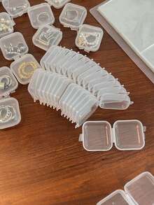 1/10/30/50 pièces Mini boîte de rangement carrée pour bijoux, boîtes de rangement pour bijoux en plastique transparent avec couvercle à charnière, autres petits articles de rangement, boîte de rangement pour artisanat, boîte à bijoux, utilisée pour ranger les boucles d'oreilles, les bagues, les colliers, la décoration et le rangement des bijoux, les petits objets ou les bricoles pour l'organisation du bureau, les cadeaux pour les femmes, les accessoires de voyage, les fournitures de maquillage, la décoration de Noël