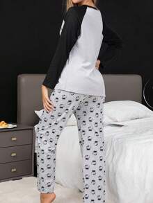 Sanrio 两件套女士Hello Kitty卡通可爱抓绒保暖睡衣套装，卡通印花长袖圆领上衣和裤子，舒适宽松版型，适合春、秋、冬穿着，温暖舒适