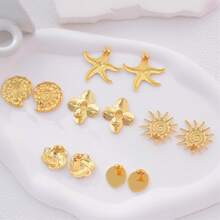 1 par de pendientes florales dorados de acero inoxidable chapado elegantes y de moda