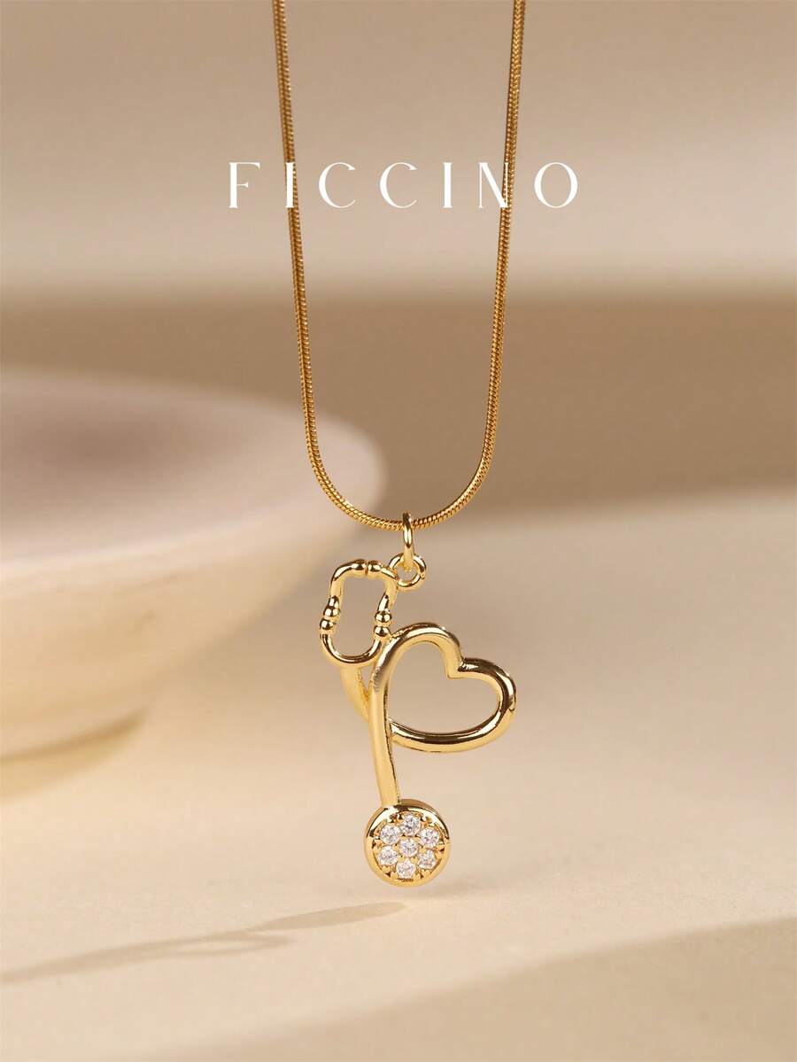 FICCINO Gold-Plated Cubic Zirconia Heart Stethoscope Pendant Necklace, Titanium Steel Gold-Plated Snake Chain Necklace, Versatile Choker Necklace, Gift For Doctors, Nurses, Holidays, Anniversaries, Comes With Box - 73n - View 1