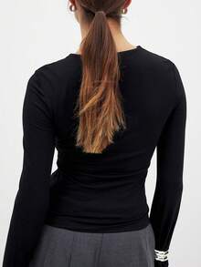 Nouveau arrivage Top à manches longues en tricot de couleur unie avec torsade et ajouré, confortable. Convient pour les vacances, l'école, les jours fériés et le port quotidien