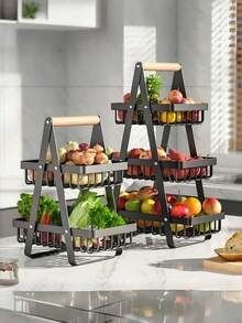 1 pieza Bandeja de cesta de frutas reforzada de 2/3 niveles, estante de almacenamiento para encimera de cocina con varillas de soporte adicionales para frutas, verduras, pan y aperitivos; estantes desmontables ahorradores de espacio adecuados para despensas, armarios y encimeras, y se utilizan a menudo para exhibición en el hogar y la cocina. Cesta de frutas negra.
