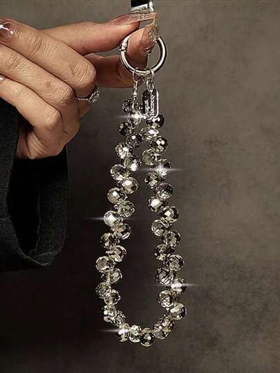 1 pieza Correa de lujo y elegante con cuentas y colgante de gota de cristal, cadena de muñeca hecha a mano para teléfono, llavero, accesorio de bolso