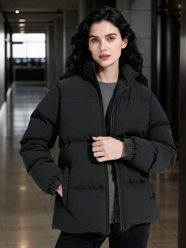 女士保暖加厚立领冬季外套，带口袋和拉链设计，舒适保暖，适合日常穿着、工作、旅行、跑步、休闲、办公、健身和户外活动。