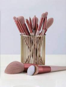 13件套化妆刷套装，柔软蓬松，专业化妆粉底刷、散粉刷、眼影晕染刷，含化妆包和化妆海绵，是送给化妆新手的理想礼物。棕色系随机颜色，刷毛柔软，方便携带，适合旅行、度假、海滩等场合，也是送给女性和女孩的夏季礼物，是返校季的完美之选。套装包含各种化妆刷，是化妆的理想之选。 - 彩色 - 查看 4