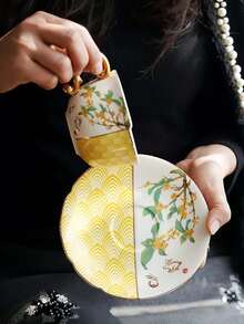 1 set de tasses et soucoupes en céramique avec motif grue et osmanthe, ensemble de tasses à lait/café asymétriques avec bordure dorée de luxe, convient pour la maison, le restaurant, le café, la pâtisserie, les cadeaux, les fêtes