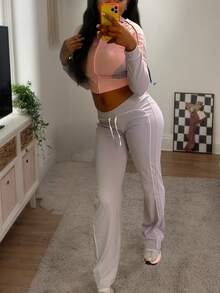 Bộ đồ thể thao thời trang nữ 2 món, áo khoác có mũ kéo khóa kết hợp với quần thể thao ống rộng, có dây rút và túi. - Hồng - Xem 5