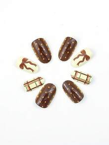 24 juegos de uñas artificiales ovaladas, diseños de lazos de color crema amarillento y café otoño-invierno, lunares, puntos redondos, cuadrícula a cuadros. Uñas artificiales acrílicas para arte de uñas, adecuadas para citas de chicas, uso diario, fiestas, como regalos para novias, etc. Realza tu belleza.