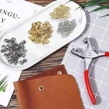 YUHOHO 1202pzs Juego de Alicates con Ojal de 6mm, 1/4 Pulgadas Alicates de Perforación, Juego de Alicates con 600 Ojales de Metal, Kit de Prensa de Mano con Ojales, Juego de Herramientas de Ojales - 1 - Ver 6