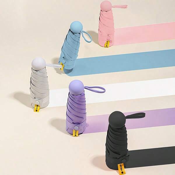 1 pieza Mini paraguas plegable multicolor popular, paraguas de bolsillo portátil para lluvia, paraguas multifuncional con protección UV contra el sol y la lluvia para aventuras diarias al aire libre, viajes, deportes, playa, picnic, camping. Con seis soportes de tubo de hierro, apertura y cierre manual, mango de plástico, estilo básico casual y lindo.