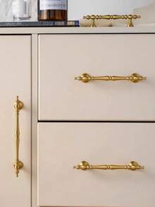 قطعة واحدة مقبض سحب درج فاخر بلون ذهبي بسيط، مناسب للأدراج والخزائن والخزانات والأثاث الخشبي الصلب، مصنوع من مادة نحاس عالية الجودة، يأتي مع البراغي