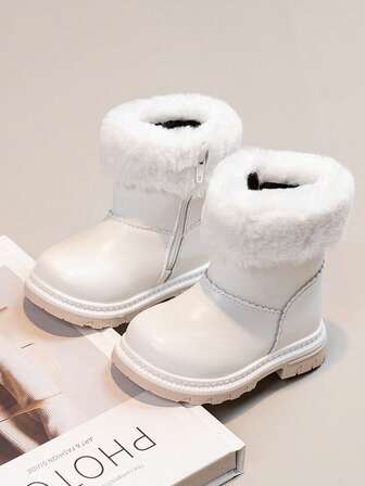 1 双女婴毛茸茸口舒适轻便保暖侧拉链设计平底雪地靴，适合秋冬季日常户外穿着