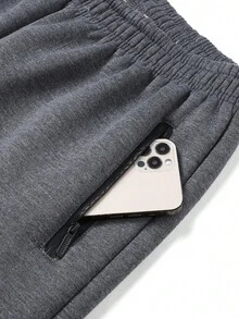 1 条男士休闲羊毛腿绑带裤，配有拉链口袋，采用厚羊毛衬里，保暖且穿着舒适惬意。