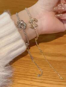 1pc Butterfly Double C Symmetry Zirconia Inlaid Adjustable Bracelet, Fashionable & Luxurious For Women