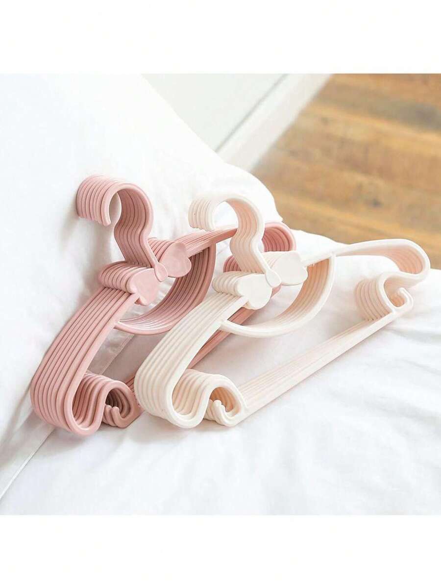 10pcs Beige Children's Clothes Hangers, Portable Display Hangers, Plastic Kids Jacket Hangers, Baby Garment Organizer