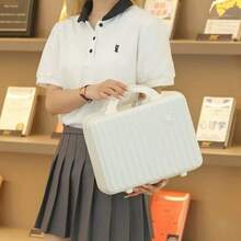 14 Inch Portable Suitcase, Cosmetics Storage Hard Shell Suitcase, Mini Small Convenient Travel Suitcase. There Is An Elastic Band On The Back That Can Be Worn Over The Luggage Handle. There Are Three Colors To Choose From: Black, White, And Pink. The Size Is 30cm * 16cm * 23cm