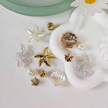 12 peças de pingentes decorativos versáteis e brilhantes em forma de estrela, concha e pétala de gota d'água, adequados para sapatos de praia de EVA, sandálias, decoração de sapatos removíveis, acessórios para meninas, presente de Natal