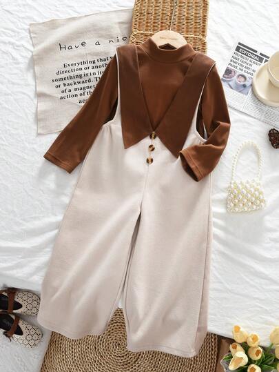 مجموعة ملابس شتوية لفتيات من سن 3 إلى 7 سنوات، تتكون من لباس علوي أساسية بأكمام طويلة وألوان سادة، وبدلة قفز مع طوق مفصل، قطعتان