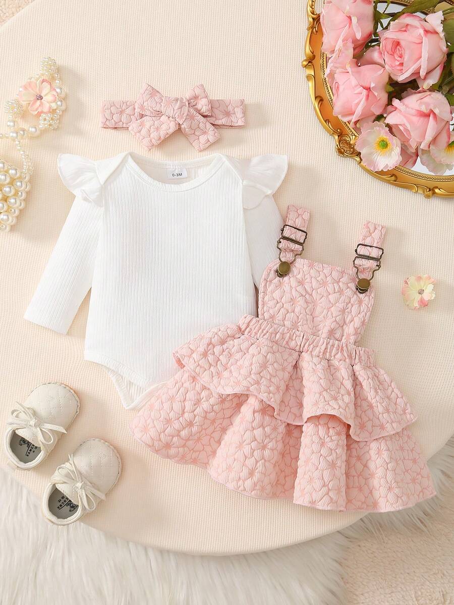 3pcs Baby Girls Set: White Ribbed Bodysuit With Flutter Sleeves, Adjustable Button Floral Layered Dress In Light Pink, And Headband - Baby Pink - View 1