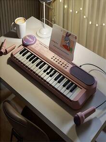 Piano de brinquedo infantil com 37 teclas, microfone e alto-falantes duplos, ideal para crianças de 3 a 8 anos. Ótimo presente de aniversário ou Natal.