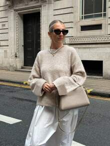 Suéter de punto de cuello redondo para mujer, estilo nuevo de otoño e invierno, manga larga, holgado y casual, versátil para Navidad y Año Nuevo