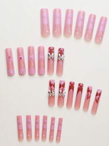 Y2K，24片超长棺材形按压指甲，红色法式风格，饰有心形、樱桃和星星图案，并以银色蝴蝶结点缀。附赠一盒果冻胶和一把锉刀。适合日常佩戴、节日和派对。 - 淺粉色 - 查看 3