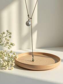 1 件可调节金色珍珠长项链，适合日常佩戴，是送给女性的最佳礼物