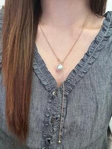 1 件可调节金色珍珠长项链，适合日常佩戴，是送给女性的最佳礼物